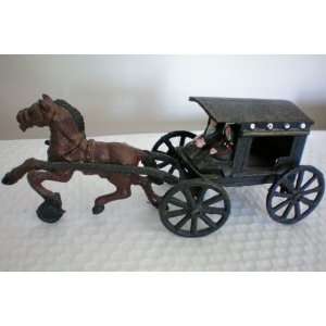 Cast Iron Horse and Buggy with Man and Woman in Seat    3 Parts Which 