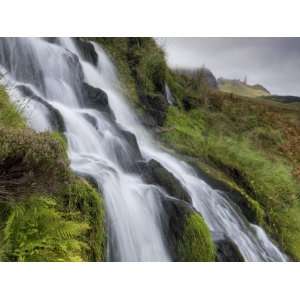  Waterfall Cascading Down Grassy Slope with Old Man of 