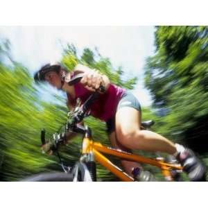  Young Female Recreational Mountain Biker Riding in the 