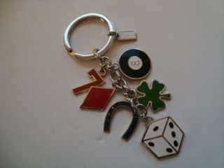 Available to you is a Coach lucky medley keychain charm. This is brand 