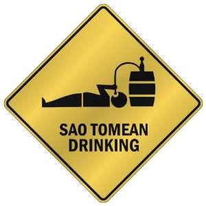    SAO TOMEAN DRINKING  CROSSING SIGN COUNTRY SAO TOME AND PRINCIPE