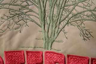   and embroidered text that reads deeper roots stronger branches 2xl