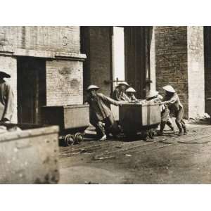  Chinese Workers Pulling Trollies Laden with Coal in Kailan 