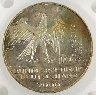 This coin has UNC characteristics and comes sealed in a plastic flip 