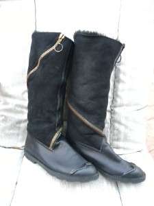 Black genuine shearling sheepskin fur boots, with assymetric zippers 