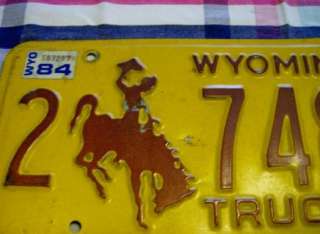 1984 Wyoming Truck License Plate Tag Cowboy Horse Bronc  