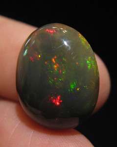   Natural Brown / Black Opal 9.6 CT Top AAA Grade Red Fire EI979  