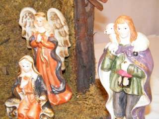   LIGHTED PORCELAIN NATIVITY IN CRECHE WOOD & MOSS 11PC SET  