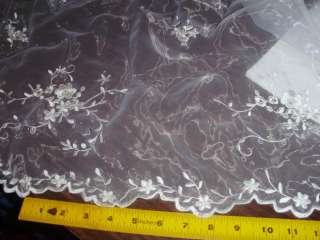 White organza w white embroidery gold outlines 52 wide  