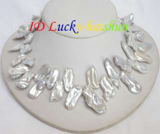 NEW AAA 33mm baroque white metallic luster REBORN KESHI pearls 
