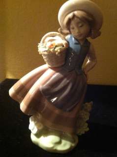 LLADRO #5221 “SWEET SCENT LLADRO”   YOUNG GIRL WITH BASKET OF 