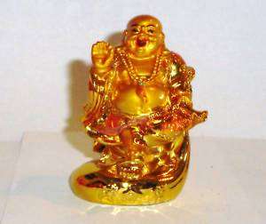 Goldener Happy Buddha mit Geldsack  