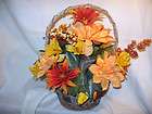 SILK FLOWER ARRANGEMENT IN A BASKET WITH HANDLE.FALL, THANKSGIVING