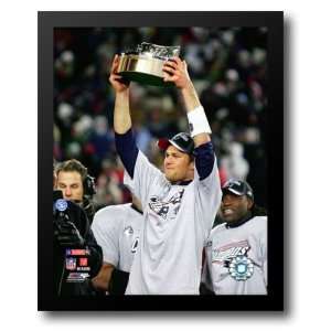 Tom Brady 2007 AFC Champ. Game celebrates with the Lamar Hunt Trophy 