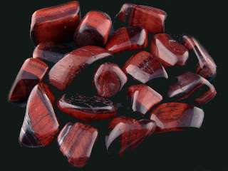 This sale is for a 1/2 pound of tumbled Red Tigers Eye per lot.