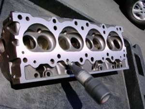 Pontiac cylinder heads rebuilt the best way possible.  