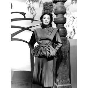 Never Say Goodbye, Eleanor Parker Modeling an Olive Green Faille Suit 