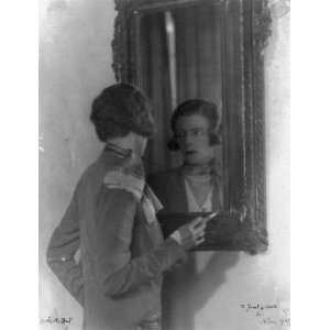   Nancy Cunard, looking at mirror, 1925 Flanner, Janet