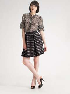   to write a review whimsical dots adorn a semi sheer chiffon style