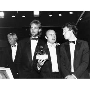  Phil Collins with Mike Rutherford and Tony Banks at the 