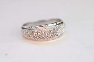 You are buying a new Rhodium over Sterling Silver Diamond Ring